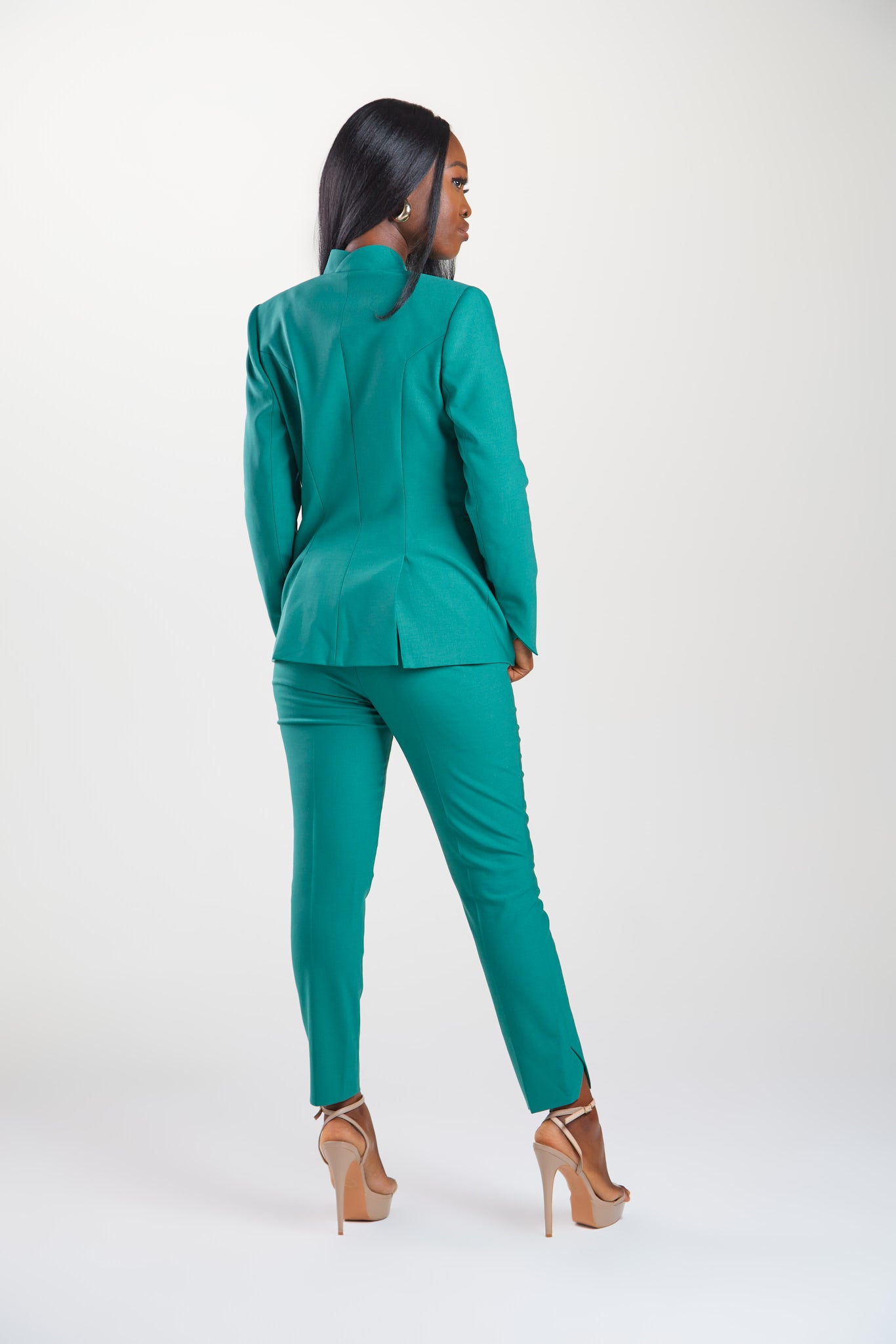 Seragyi's Nicole Blazer in Women's Suits, made from Italian Merino Wool. Features a cross-over collar and pyramid-cut sleeves, blending elegance and comfort in Women's Clothing.