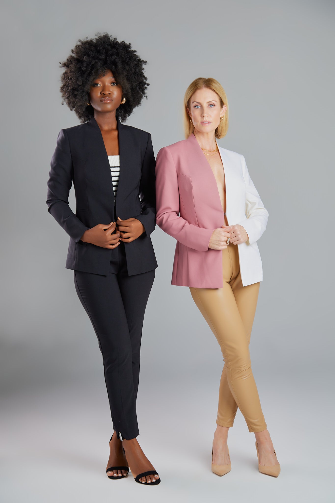 Seragyi's Nicole Blazer in Women's Suits, made from Italian Merino Wool. Features a cross-over collar and pyramid-cut sleeves, blending elegance and comfort in Women's Clothing.