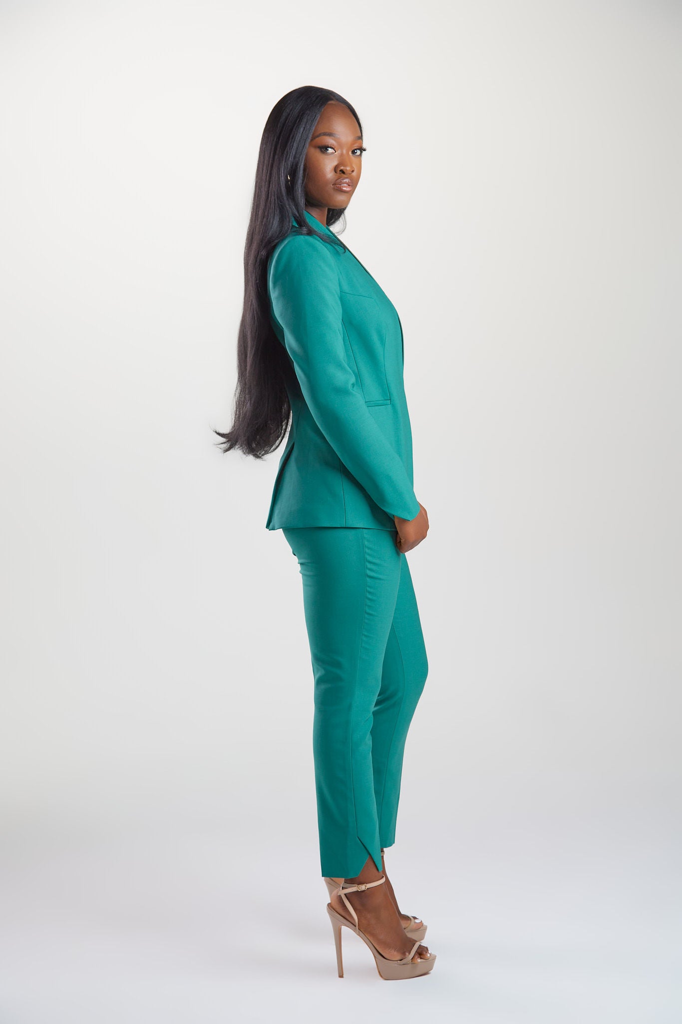 Seragyi's Nicole Blazer in Women's Suits, made from Italian Merino Wool. Features a cross-over collar and pyramid-cut sleeves, blending elegance and comfort in Women's Clothing.